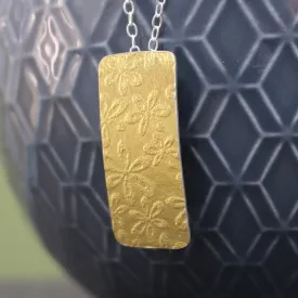 Golden Floral Tag Pendant